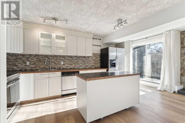 Photo 1 - Kitchen - 6, 2031 34 Avenue SW, Calgary, AB T2T2C4