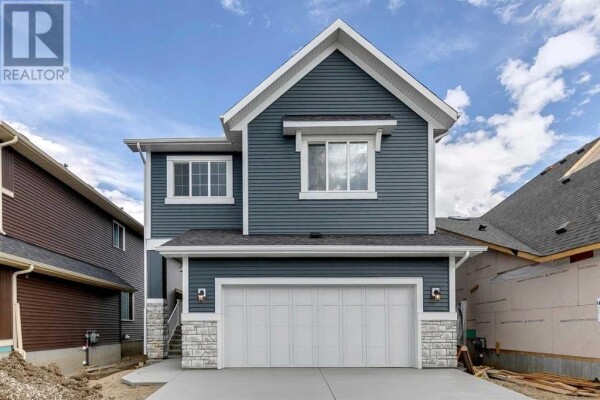 Photo 1 - FrontYard - 42 Creekside Grove SW, Calgary, AB T0L0X0