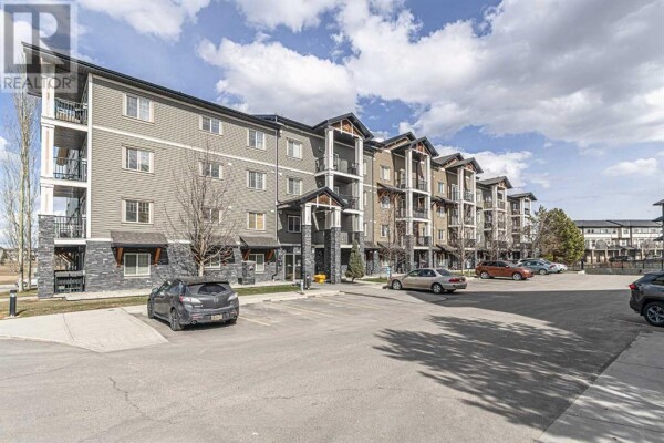 Photo 1 at 1306, 175 Panatella Hill NW, Calgary, AB T3K0V9