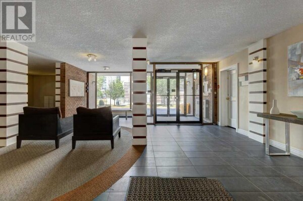 Photo 3 - LivingRoom - 707, 1123 13 Avenue SW, Calgary, AB T2R0L7