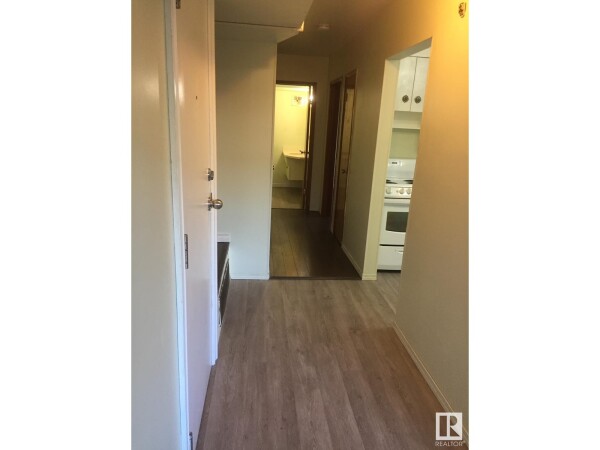 Photo 3 at 13007 83 ST NW, Edmonton, AB T5E2T4