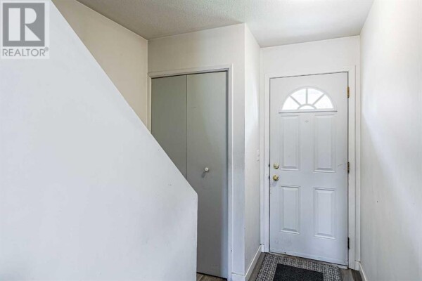 Photo 3 at 11, 64 Whitnel Court NE, Calgary, AB T1Y5E3