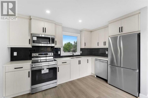 Photo 1 - Kitchen - 3869 Fonda Way SE, Calgary, AB T2A5R4