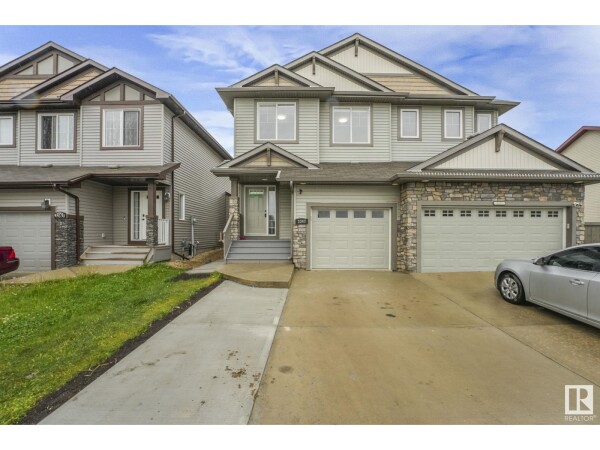 Photo 1 - FrontYard - 3347 14 AV NW, Edmonton, AB T6T0V1