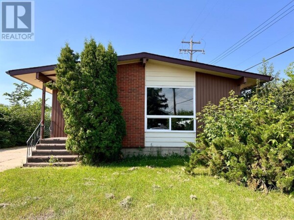 Photo 1 - Backyard - 1013 7 Avenue, Wainwright, AB T9W1H3