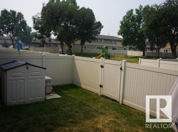 Photo 2 - Backyard - #38 8930 99 AV, Fort Saskatchewan, AB T8L3L1