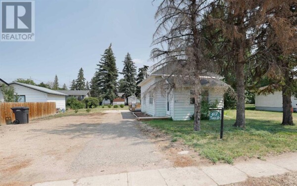 Photo 1 - Backyard - 617 Tulip Street, Rosemary, AB T0J2W0