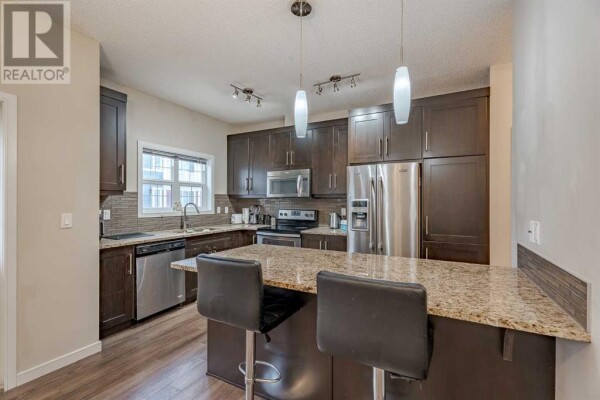 Photo 3 - Kitchen - 71 Evansridge Court, Calgary, AB T3P0P3