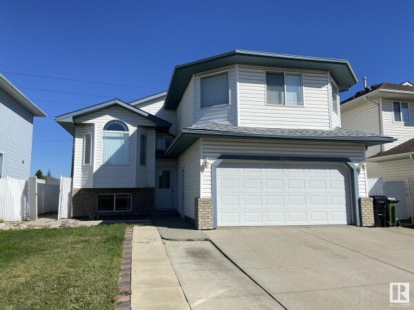 Photo 1 - FrontYard - 7516 162 AV NW, Edmonton, AB T5Z3S7