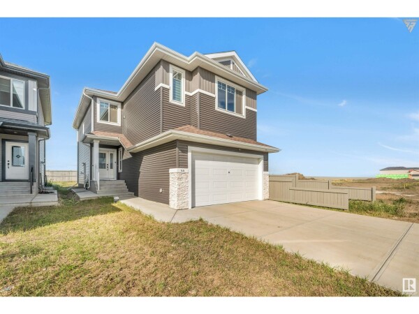 Photo 2 - FrontYard - 7424 182 AV NW, Edmonton, AB T5Z0M1