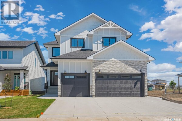 Photo 1 at 107 Woolf BEND, Saskatoon, SK S7W1E6