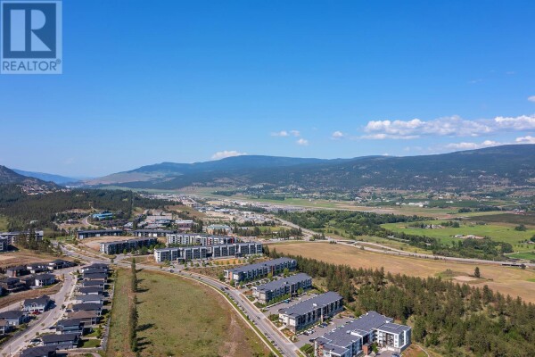 Photo 2 - Backyard - 655 Academy Way Unit# PH12, Kelowna, BC V1V3A4