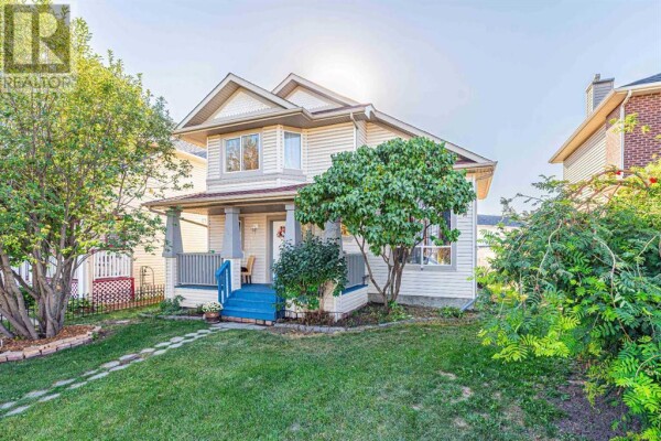 Photo 2 at 127 Erin Meadow Way SE, Calgary, AB T2B3P7