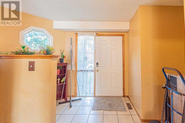 Photo 3 at 127 Erin Meadow Way SE, Calgary, AB T2B3P7