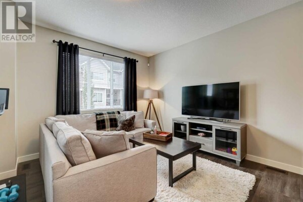 Photo 2 - LivingRoom - 107, 355 Nolancrest Heights NW, Calgary, AB T3R0Z9