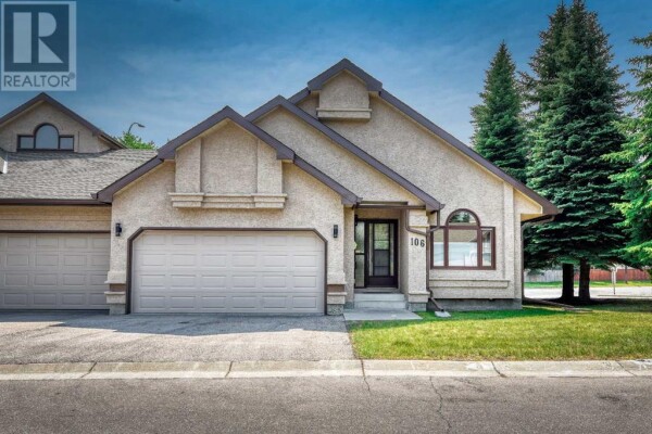 Photo 2 - FrontYard - 106 Oakbriar Close SW, Calgary, AB T2V5H2