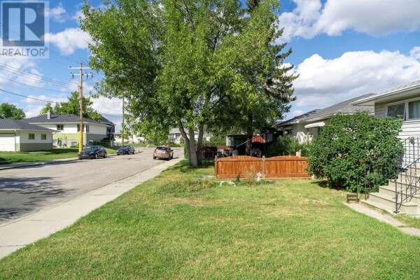 Photo 2 - Backyard - 4412 Centre A Street NE, Calgary, AB T2E3B1