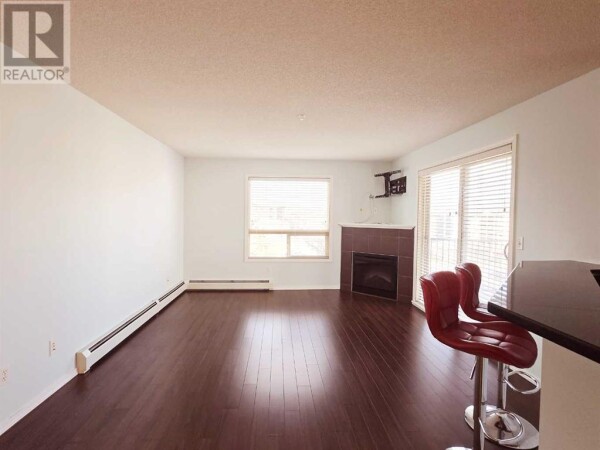 Photo 3 - LivingRoom - 1301, 60 Panatella Street NW, Calgary, AB T3K0M1