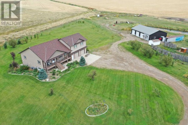 Photo 1 - Backyard - 91041 Rge Rd 164, Taber, AB T1G2C9