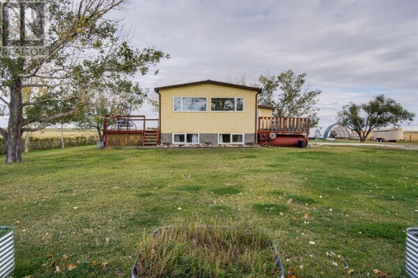 Photo 3 - Backyard - 380 59 Avenue, Claresholm, AB T0L0T0