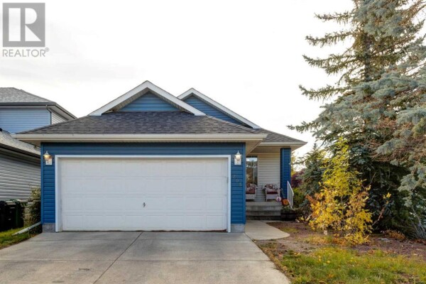 Photo 1 - FrontYard - 205 Somerset Drive SW, Calgary, AB T2Y3K2