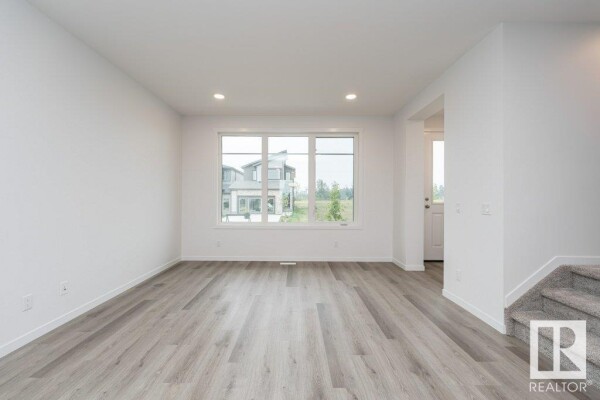 Photo 3 - Bedroom - 2433 TRUMPETER WY NW, Edmonton, AB T5S0S9