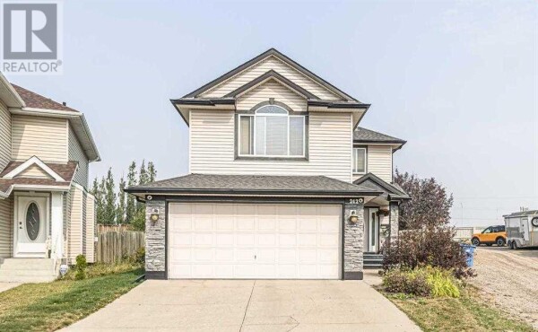 Photo 1 - FrontYard - 242 Coville Circle NE, Calgary, AB T3K5N8