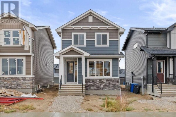 Photo 1 at 68 Shale Avenue, Cochrane, AB T4C3G6