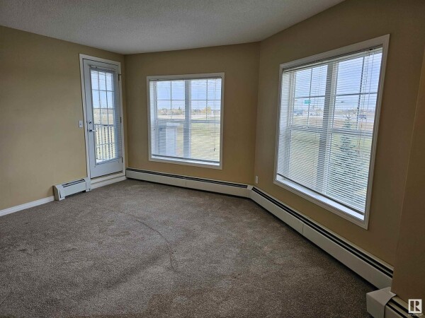 Photo 2 - Bedroom - #406 636 MCALLISTER LO SW, Edmonton, AB T5W1N4