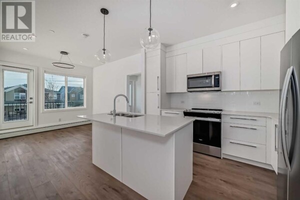 Photo 1 - Kitchen - 4211, 111 Wolf Creek Drive SE, Calgary, AB T2X5X2