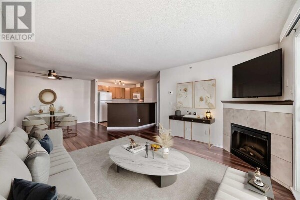 Photo 3 - LivingRoom - 1408, 10 Prestwick Bay SE, Calgary, AB T2Z0E6