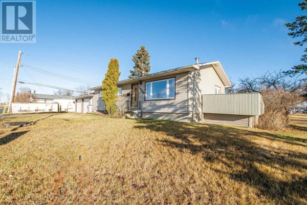 Photo 1 - Backyard - 10140 112 Avenue, Grande Prairie, AB T8V1V7