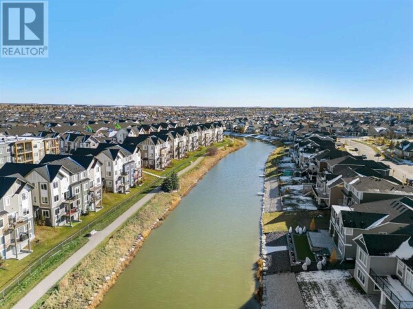 Photo 3 - Backyard - 484 Canals Crossing SW, Airdrie, AB T4B3J4