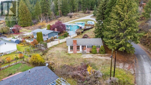 Photo 1 - Backyard - 1110 McDiarmid Road, Castlegar, BC V1N4V8