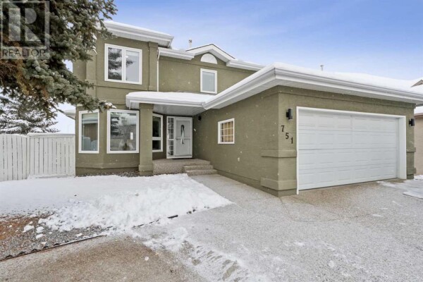 Photo 1 at 751 Mckenzie Lake Bay SE, Calgary, AB T2Z2J2