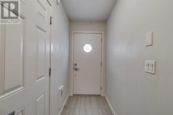 Photo 3 at 526 Walden Circle SE, Calgary, AB T2X0Y4