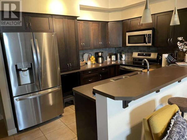 Photo 3 - Kitchen - 221, 100 Lakeway Boulevard, Sylvan Lake, AB T4S0A4