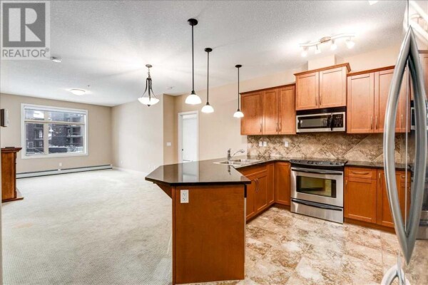 Photo 3 - Kitchen - 311, 35 Aspenmont Heights SW, Calgary, AB T3H0E5