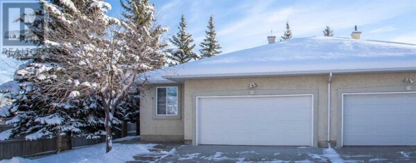 Photo 1 at 2 Cedarview Mews SW, Calgary, AB T2W6H8