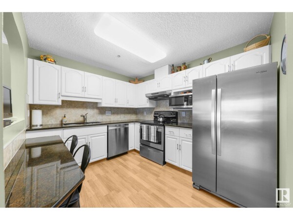 Photo 3 - Kitchen - #212 10610 76 ST NW NW, Edmonton, AB T6A3Y9