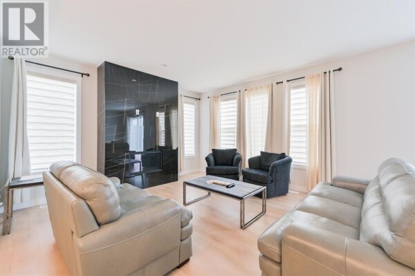 Photo 3 - LivingRoom - 153 Cranbrook Cove SE, Calgary, AB T3M2S9