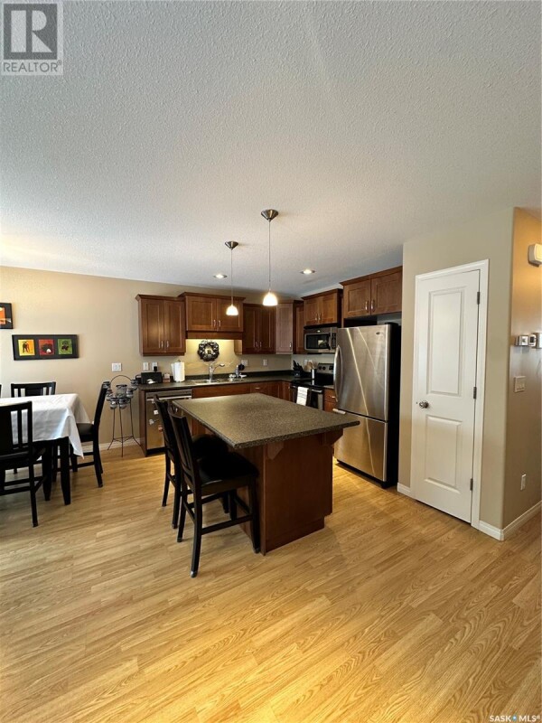 Photo 2 at 28 547 East Hampton BOULEVARD, Saskatoon, SK S7R0H8