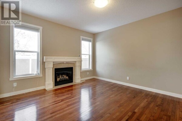 Photo 2 - LivingRoom - 75 Cranleigh Heath SE, Calgary, AB T3M0E6