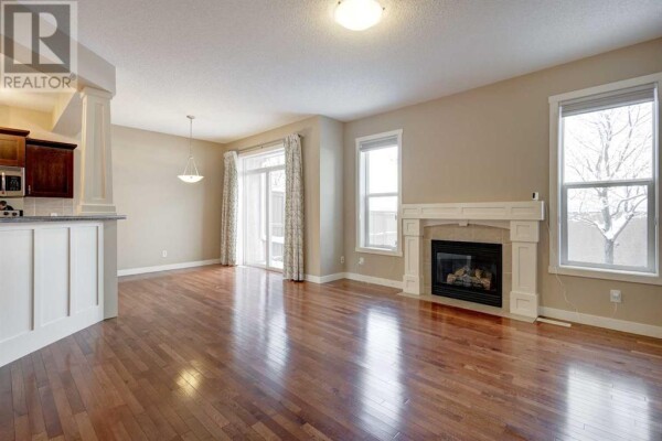 Photo 3 - LivingRoom - 75 Cranleigh Heath SE, Calgary, AB T3M0E6