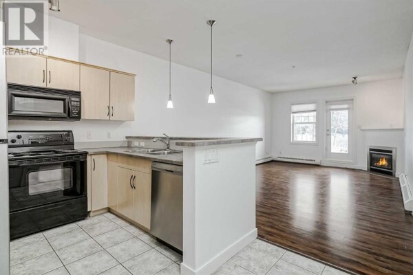 Photo 2 - Kitchen - 105, 1408 17 Street SE, Calgary, AB T2G5S8