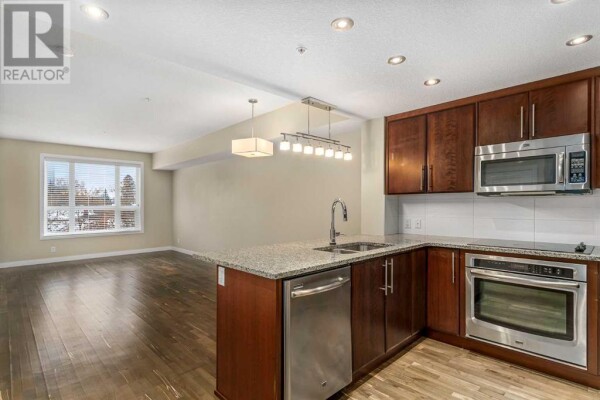 Photo 3 - Kitchen - 312, 1110 3 Avenue NW, Calgary, AB T2N4J3